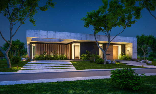 istock 3d rendering of new concrete house in modern style in night 1397488935