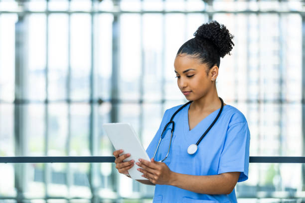 istock Medical practitioner using a digital tablet in a hospital 1397495462