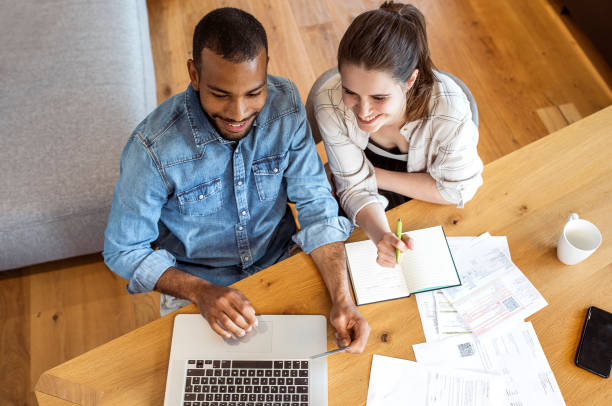 istock Young couple planning their finances together 1397496325