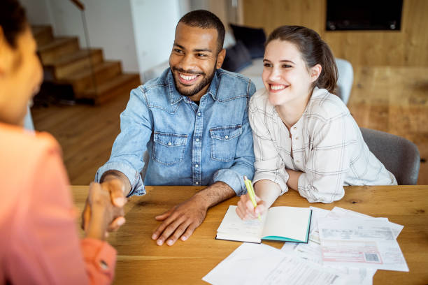 istock Young couple planning their finances together 1397496347