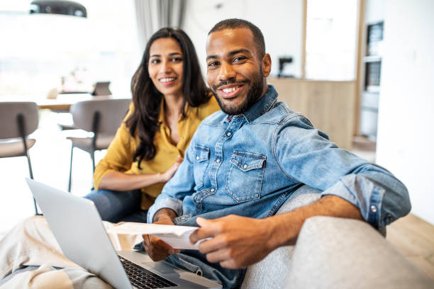Young couple planning their finances together