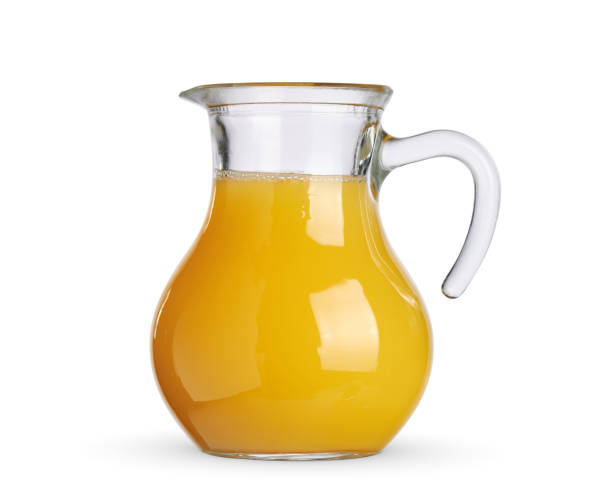 istock jug of orange juice isolated on white 1397496470