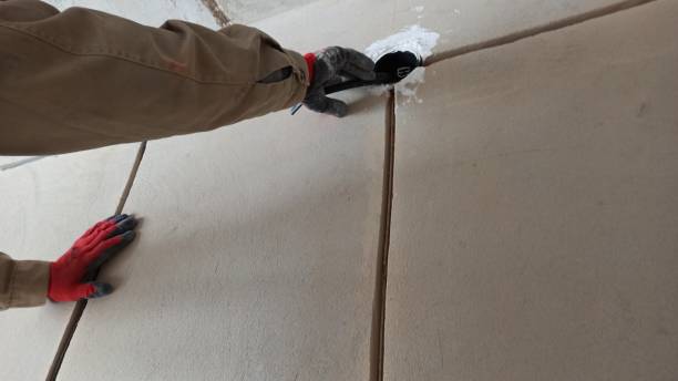 istock Hands of an electrician at work with electrical wiring, electrical work 1397498322