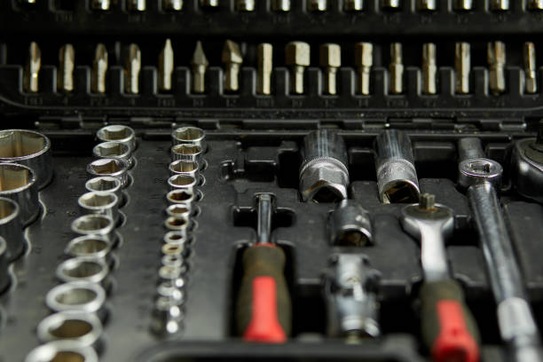 istock Open set box with working tools different types of metal steel heads and bits at the workshop, Interchangeable screwdriver set. 1397499449