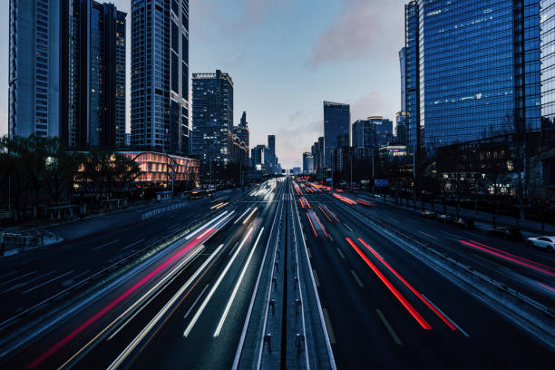 istock Traffic moving in both directions at dusk 1397499542
