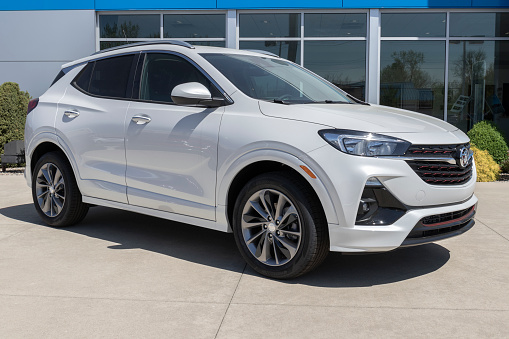 Kendallville - Circa May 2022: Buick Encore SUV display. The Encore has Amazon Alexa, Apple CarPlay and Android Auto built in.