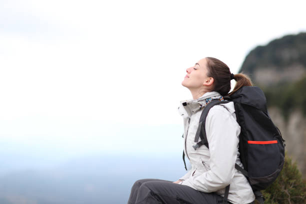 istock Trekker breathing fresh air resting in the mountain 1397500402