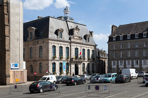 Saint-Brieuc, France - May 09 2022: City hall of Saint-Brieuc next to the Cathedral of St Étienne.