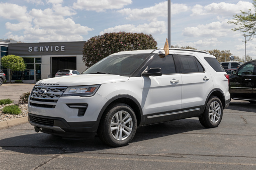 Elkhart - Circa May 2022: Used Ford Explorer display at a dealership. With supply issues, Ford is buying and selling many pre-owned cars to meet demand
