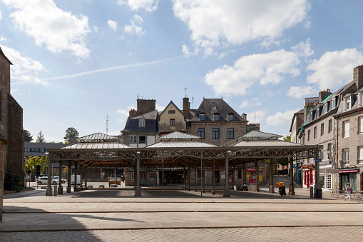 Saint-Brieuc, France - May 09 2022: The Halles Georges Brassens on Place du Martray next to the 14th century Cathedral of St Étienne.