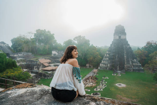 istock Woman exploring Tikal National Park 1397505225
