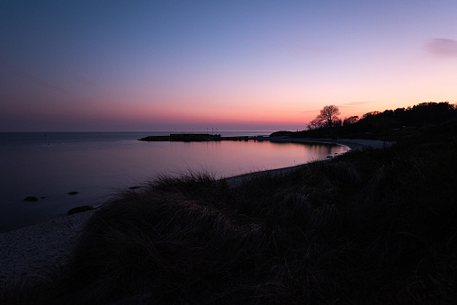Orange and blue tones combined after the sunset off the Southeast coast of Bornholm, Denmark.
