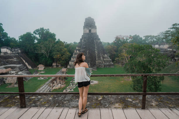 istock Woman exploring Tikal National Park 1397506060
