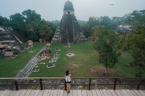 Young Caucasian woman exploring Tikal National Park