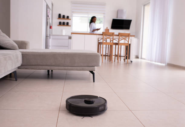 istock Remote control of robot vacuum cleaner. 1397506861