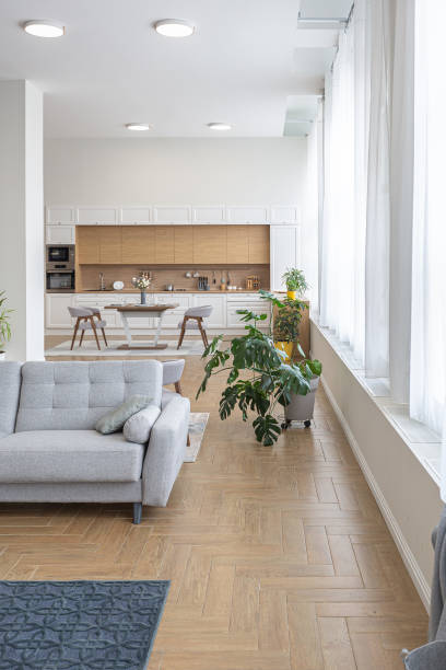 istock minimalist modern interior design huge bright apartment with an open plan in Scandinavian style in white, blue and dark blue colors with columns in the center. includes kitchen area, office and lounge 1397509414