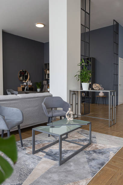 istock minimalist modern interior design huge bright apartment with an open plan in Scandinavian style in white, blue and dark blue colors with columns in the center. includes kitchen area, office and lounge 1397510034
