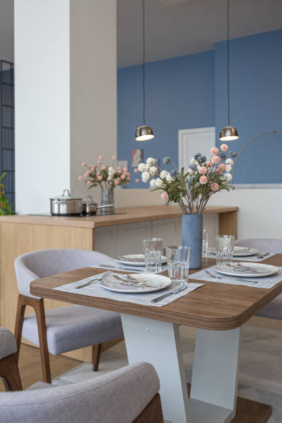 istock minimalist modern interior design huge bright apartment with an open plan in Scandinavian style in white, blue and dark blue colors with columns in the center. includes kitchen area, office and lounge 1397510047