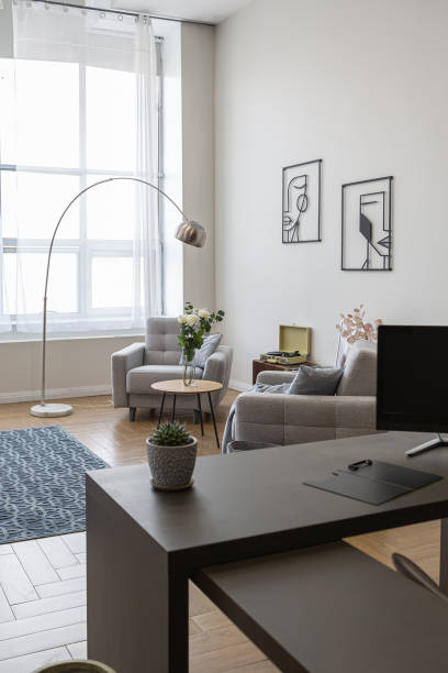 istock minimalist modern interior design huge bright apartment with an open plan in Scandinavian style in white, blue and dark blue colors with columns in the center. includes kitchen area, office and lounge 1397510070