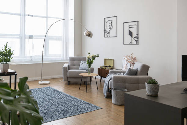 istock minimalist modern interior design huge bright apartment with an open plan in Scandinavian style in white, blue and dark blue colors with columns in the center. includes kitchen area, office and lounge 1397510081