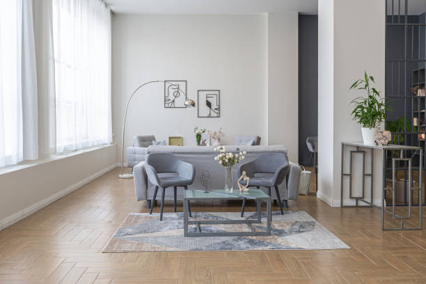 istock minimalist modern interior design huge bright apartment with an open plan in Scandinavian style in white, blue and dark blue colors with columns in the center. includes kitchen area, office and lounge 1397510092