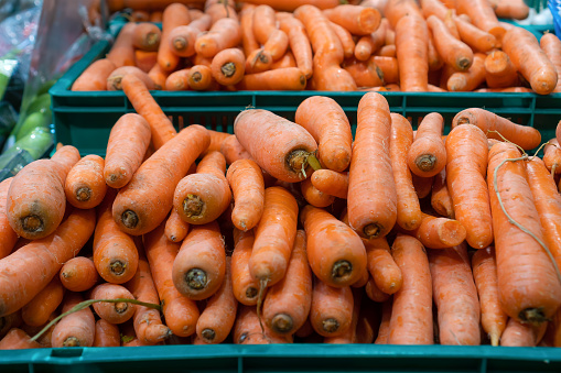 Close up of the orange carrot , background. Fresh carrot variety grown in the shop. Tasty and healthy food