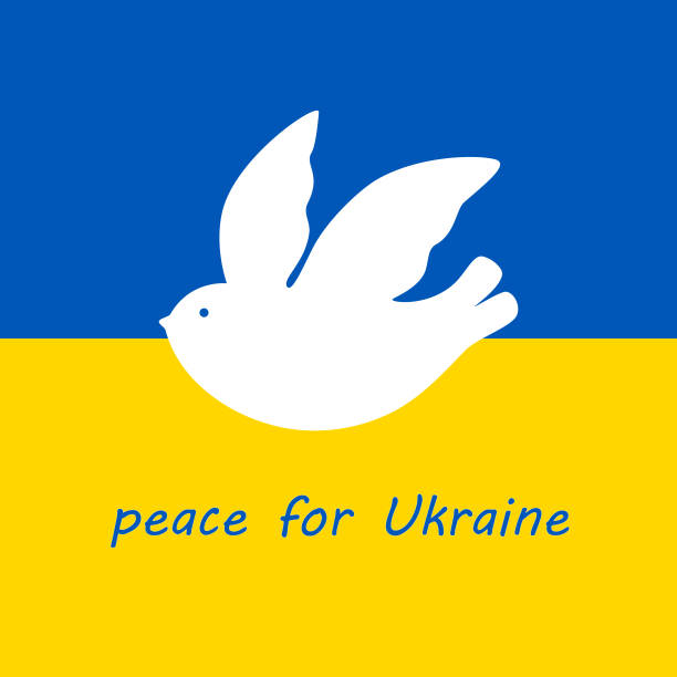 istock Ukraine flag and dove peace symbol and pray for peace in Ukraine concept 1397512978