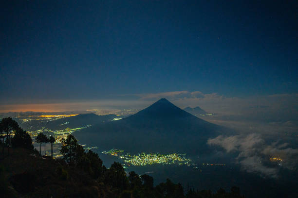 Antigua city illuminated. View from Agua volcano, Guatemala