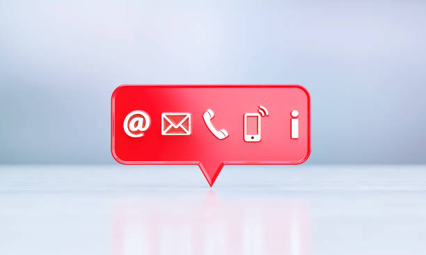 istock Red Speech Bubble With Various White Contact Us Symbols Sitting Before Silver Defocused Background 1397514125