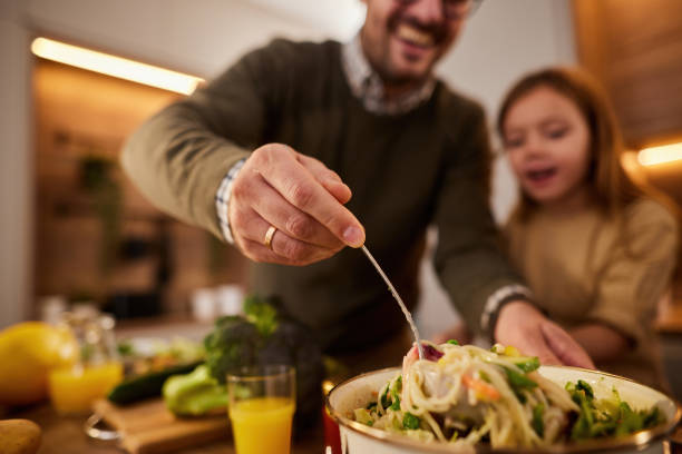 istock Close up of making a meal in the kitchen. 1397514208