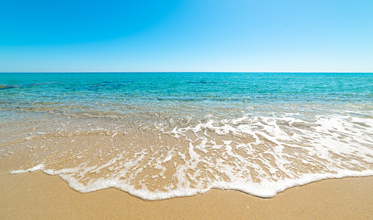 Piscina Rei beach under a blue sky in springtime. Sardinia, Italy