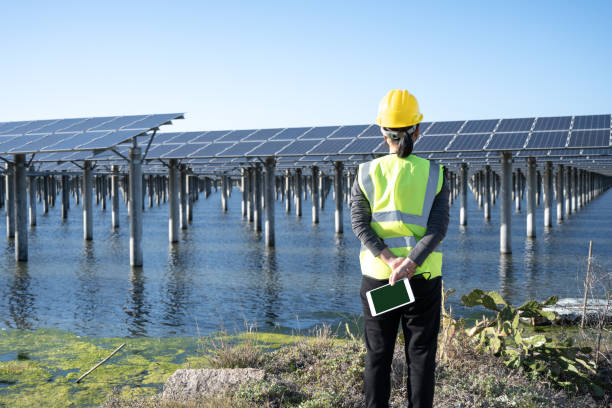 istock An engineer manager uses a tablet to check the operation of the solar panel system of a solar station 1397515878