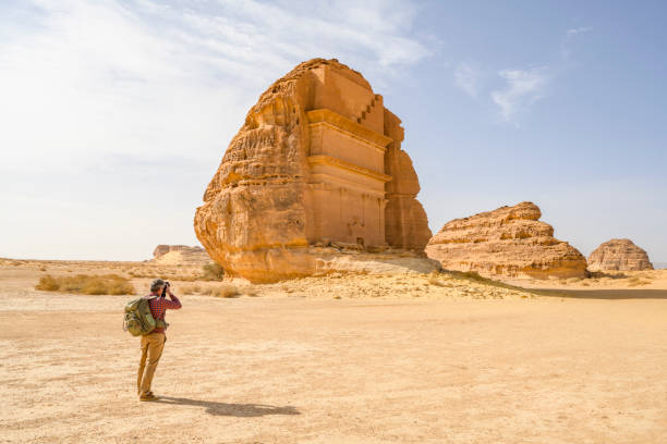 istock World travelling photographer taking pictures in Hegra 1397522865