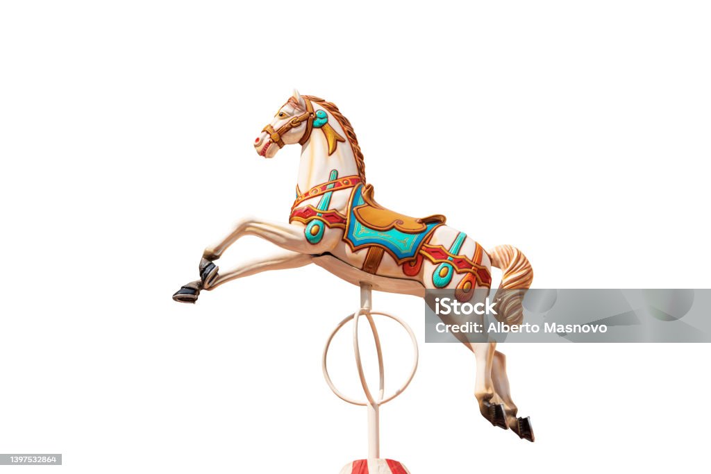 Carousel Horses or Merry-go-round Isolated on White Background Close-up of a plastic horse of a carousel horses or merry-go-round isolated on white background. Italy, Europe. Carousel Stock Photo