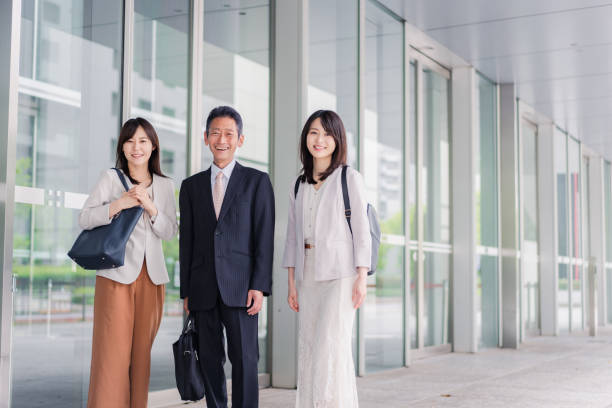 istock Businesspersons walking in the office district 1397534877