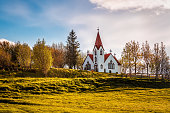 istock White Scandinavian church in Iceland 1397536321