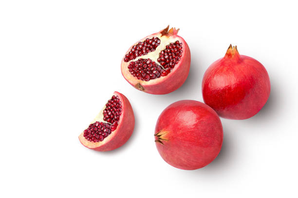 frutto di melograno con foglia verde - pomegranate fruit tropical fruit freshness foto e immagini stock