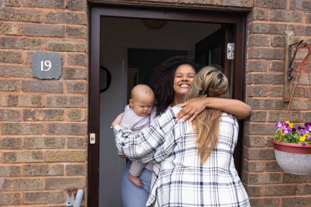 istock Two Friends and a Newborn 1397537984