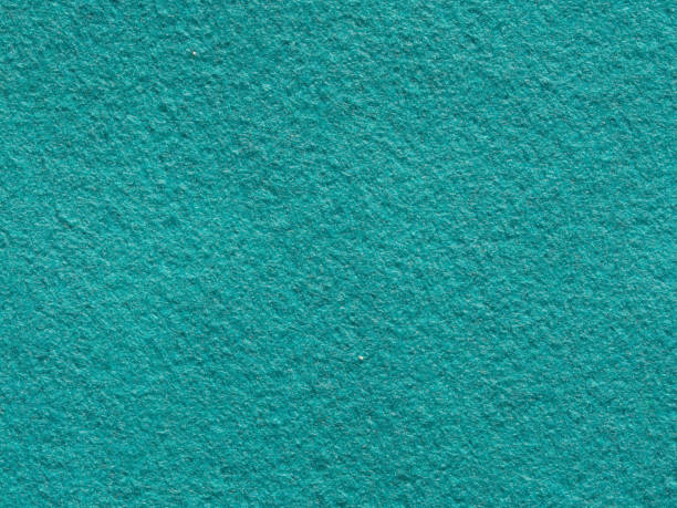 istock Background texture of light blue felt. The texture of turquoise piled wool or wool felt. Felt fabric with fine grain 1397538297