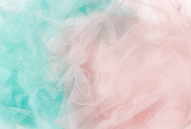 istock Abstract pastel colors background, pink and blue light wrinkled fabric 1397539709
