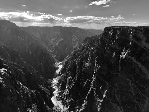 The painted wall of Black Canyon of the Gunnison in black and white.