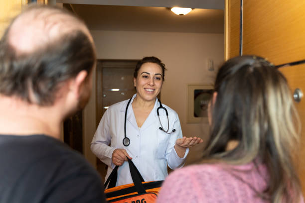 istock Doctor visiting family at home 1397543874