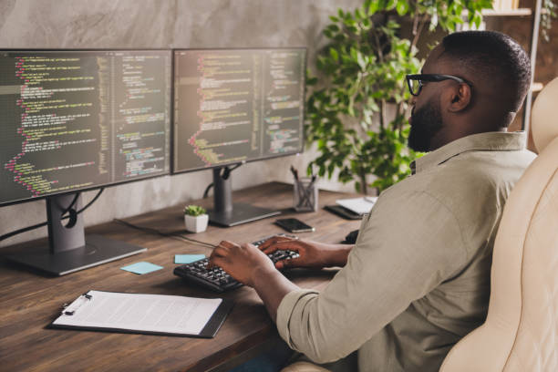 istock Profile photo of smart serious web designer keyboard writing implement sit chair workstation office indoors 1397544785