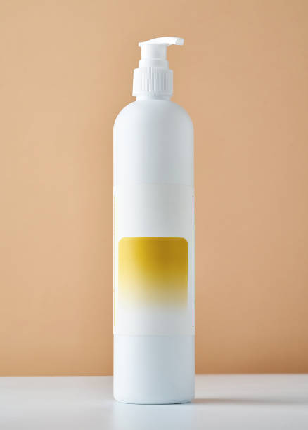 istock Shampoo bottles with empty labels. Mocap of hygiene products 1397545841