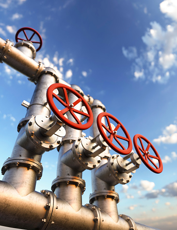 Industrial oil pipeline at a modern refinery with large red valves for cutting supply 3d render
