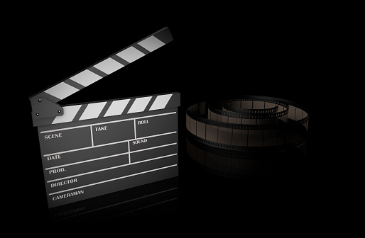High resolution 3D render of film clapperboard with reel