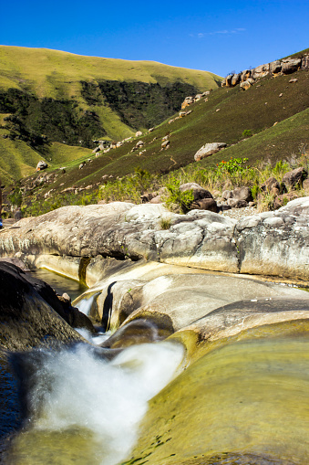 This is the Old woman stream were it flows over Marble baths, so named due to the smoothly weathered sandstone rock. The Drakensberg Park were declared a Unesco World Heritage site in 2000 to protect the natural habitats, but also due to its cultural significant since it has the largest concentration of rock paintings in Sub Sahara Africa.