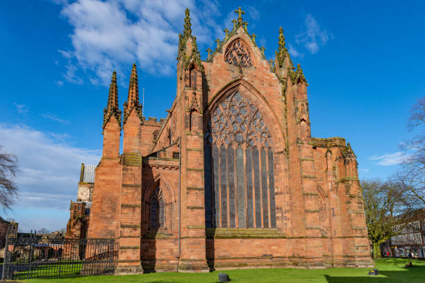 Carlisle Cathedral in the spring sunshine.  The second smallest of England's ancient cathedrals it was founded as an Augustinian priory and became a cathedral in 1133.  Carlisle, Cumbria, UK.