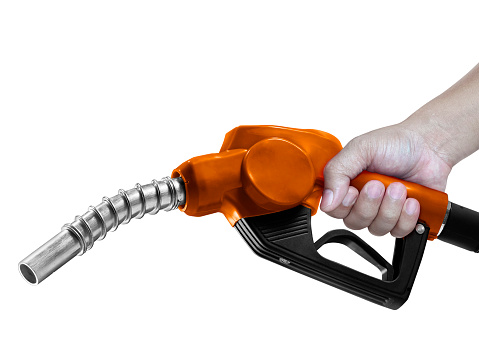 Hands holding Fuel. nozzle with hose isolated on white background