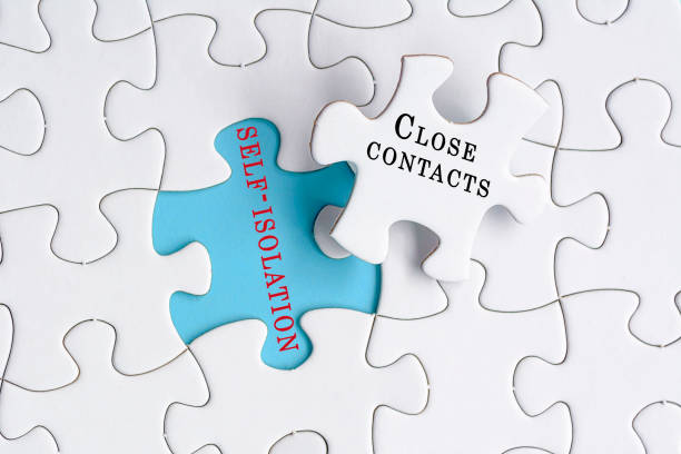 istock Close contacts and self isolation text on Jigsaw Puzzle. Pandemic concept. 1397556165